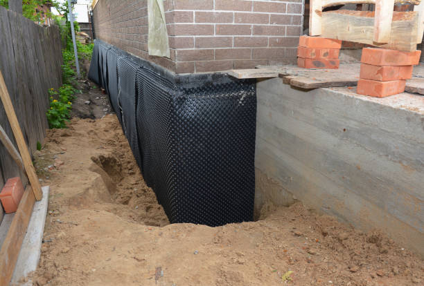 Happy homeowners after waterproofing job in Gibbsboro